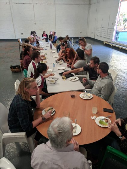 Volunteers enjoy a lunch together