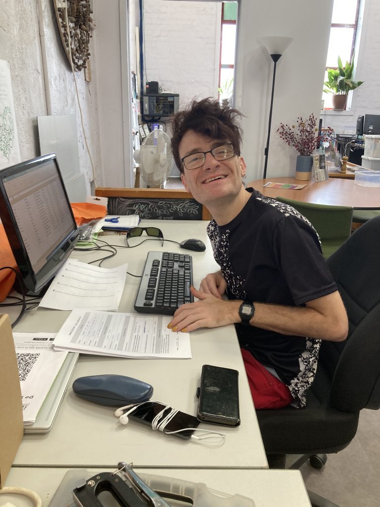 Matt volunteering in the office