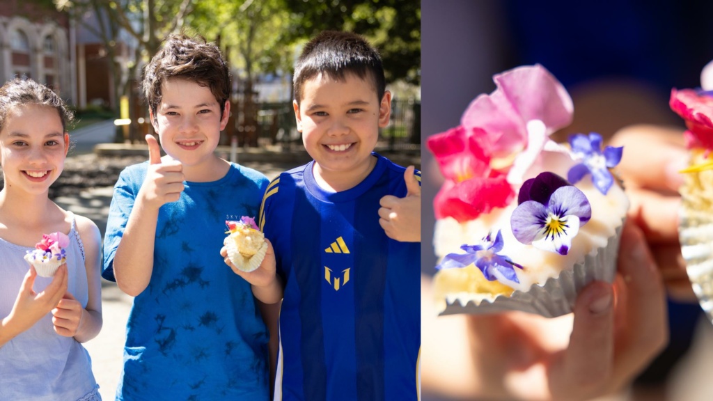 Three children proudly showcase the cupcakes they decorated with edible flowers at BLOOM into the Cultural Centre.